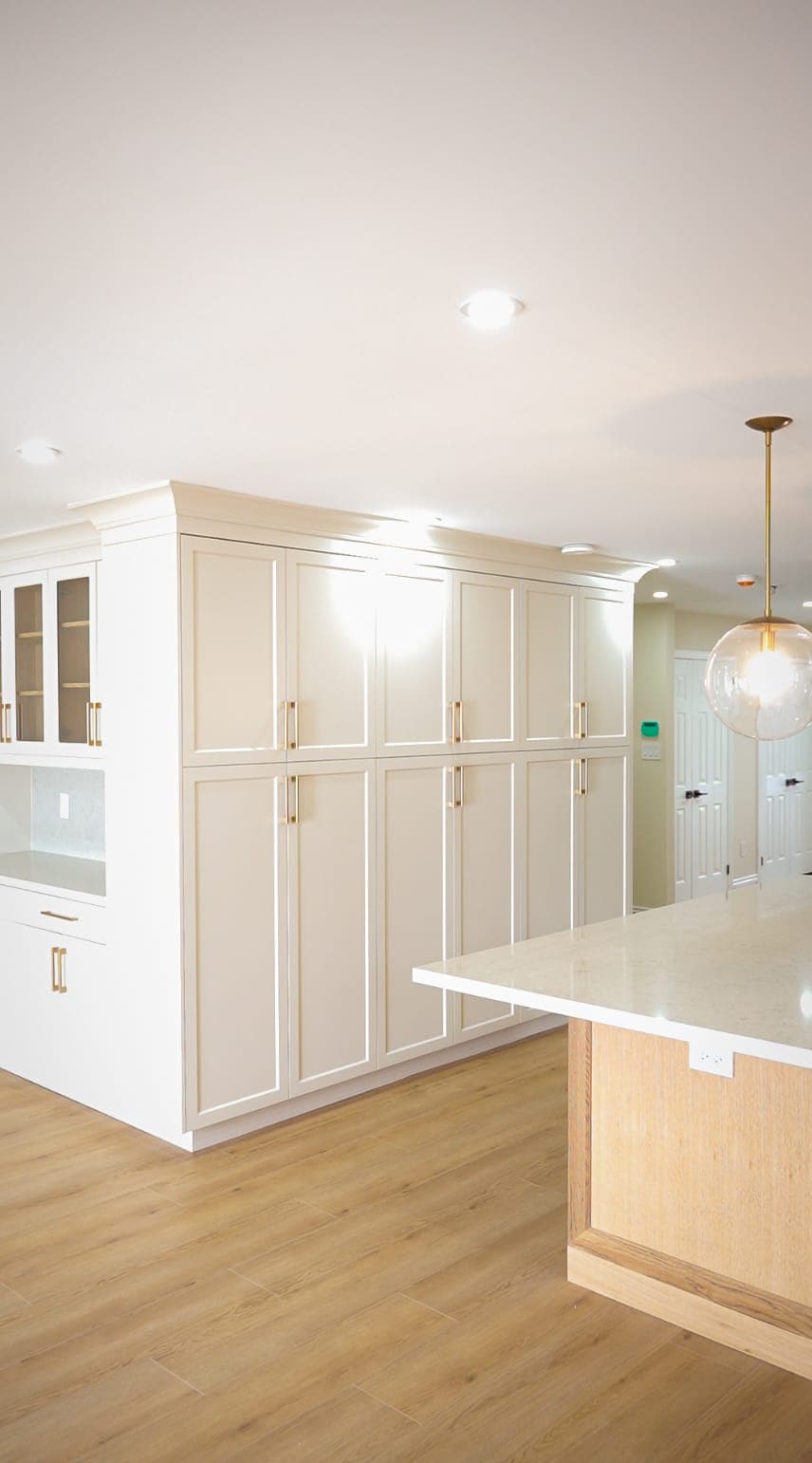 Floor-to-ceiling pantry cabinetry wall