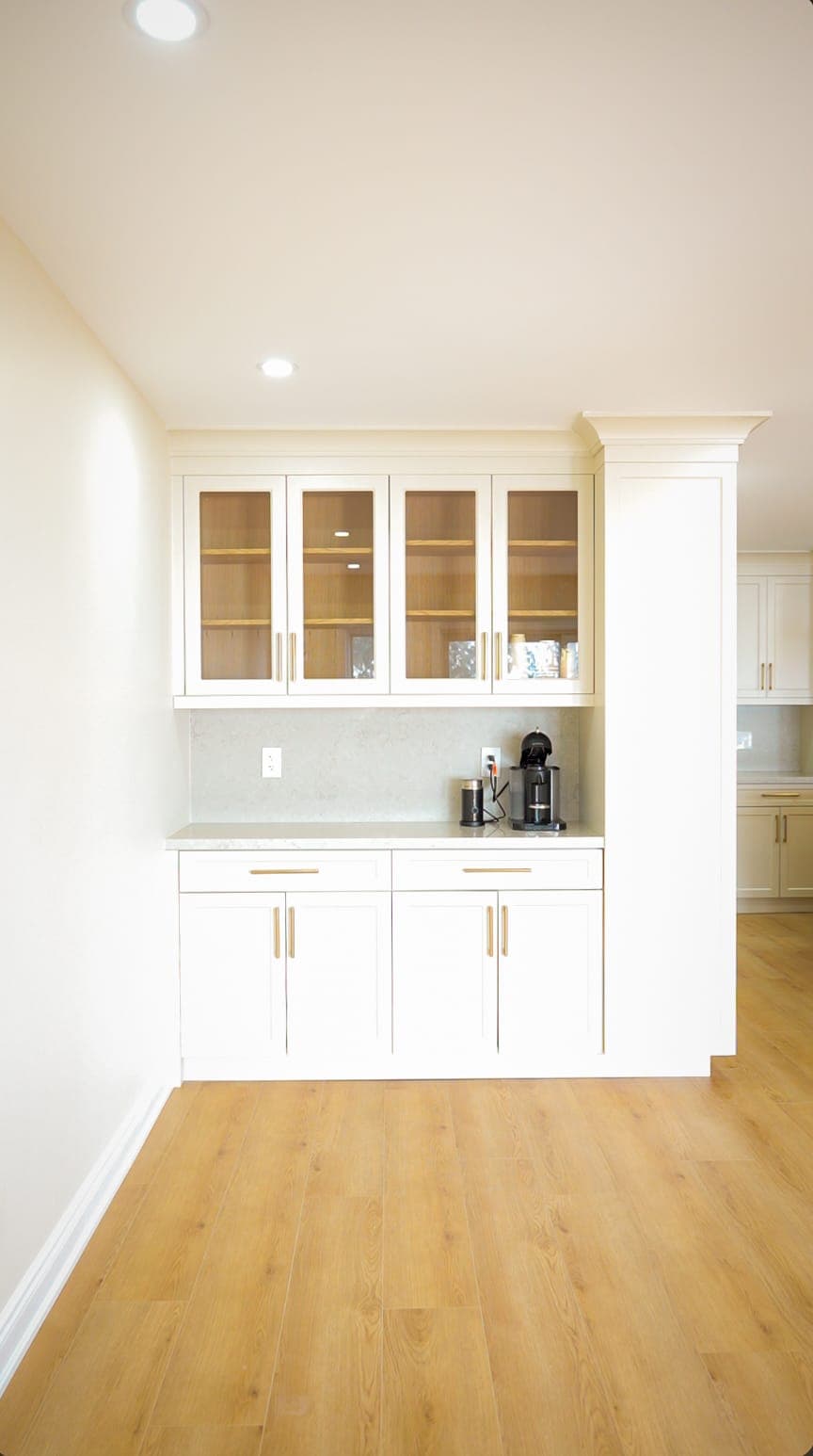 Built-in coffee bar with glass-front cabinetry