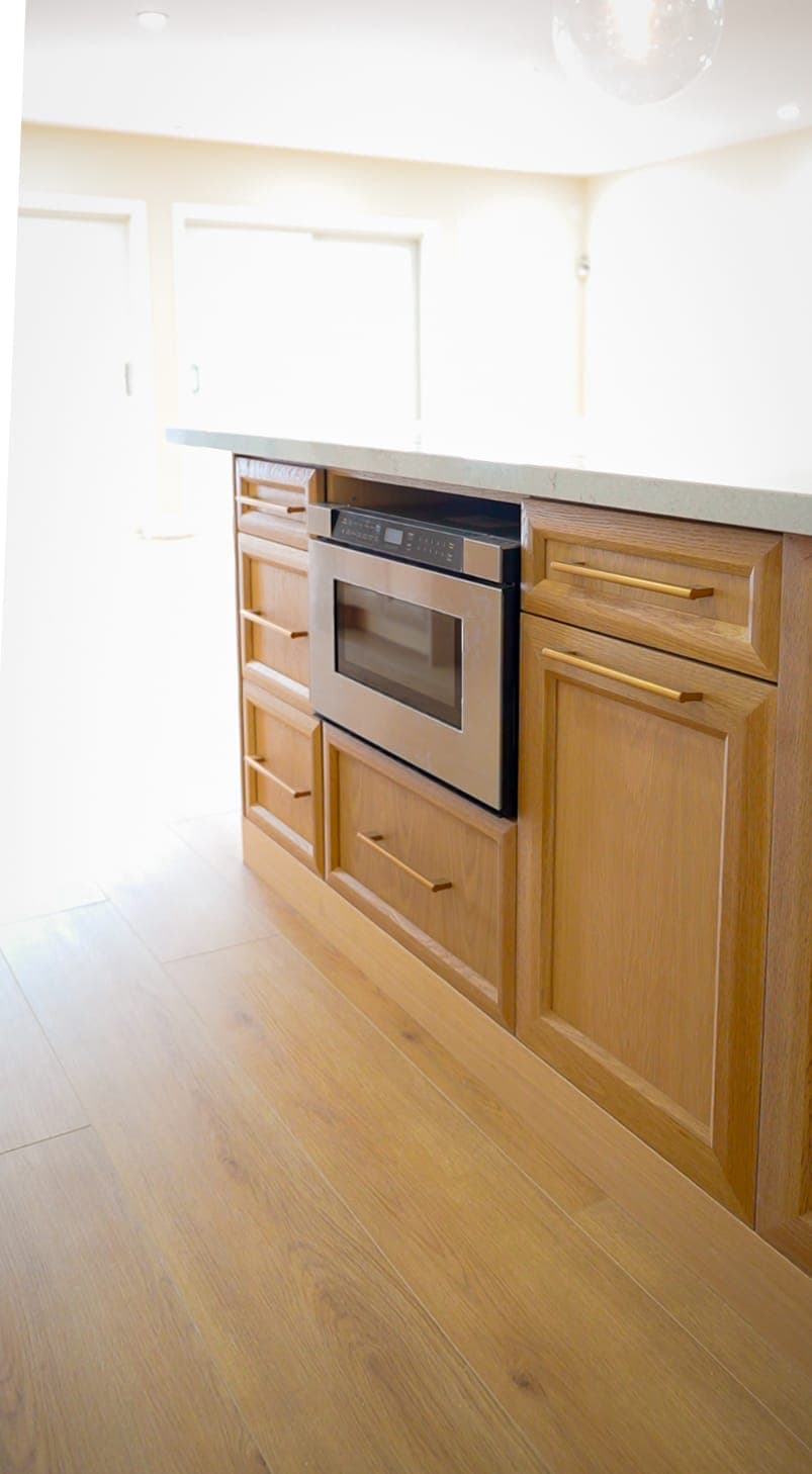 Built-in microwave drawer detail in kitchen island