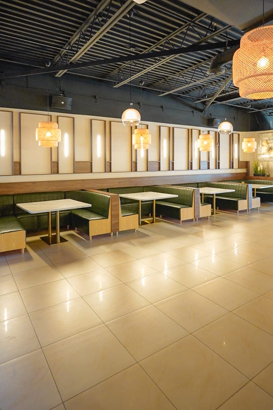 Restaurant booth seating along a feature wall