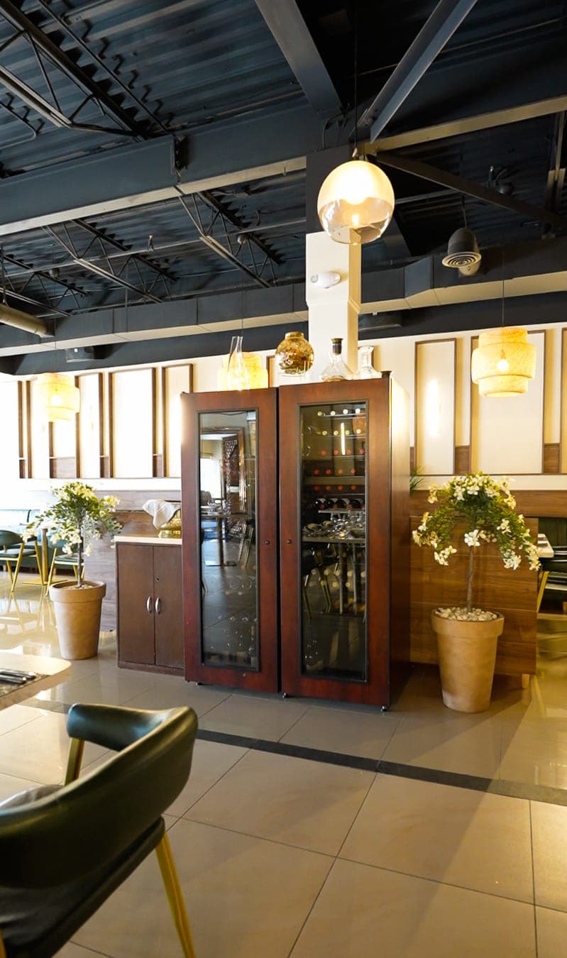 Glass wine display cabinet in the restaurant