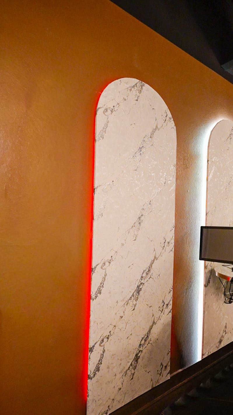 Backlit marble archway wall detail